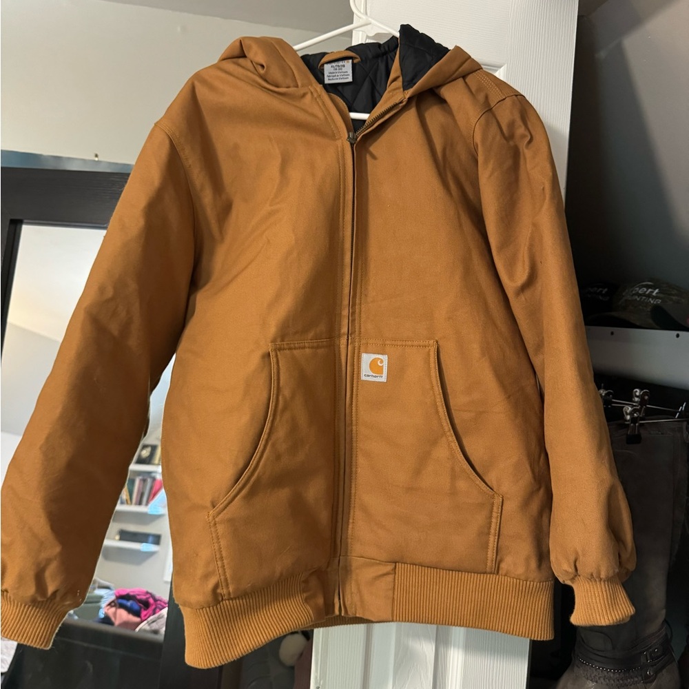 Used, like new Carhartt. It’s a kids XL I wear a medium in women’s and it fits.